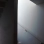Monolithe dans l&rsquo;escalier